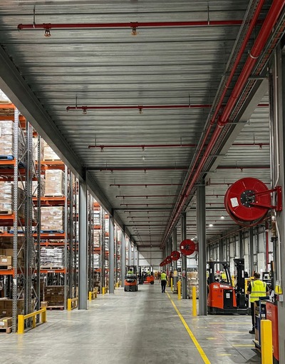 Logistics and industrial sector image with sprinkler system context
